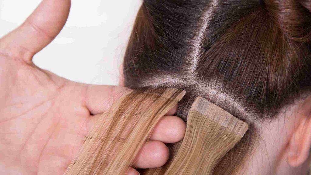 Tape-in extensions are semi-permanent and they are applied using adhesive tape.